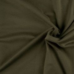 an olive green plain fabric with a very thin line on the bottom, and a small amount