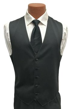 Men's Black Satin Tuxedo Vest and Tie This is a handsome black satin tuxedo vest from Larr Brio paired with a matching long tie.  The vest features a five button front and a solid black back.  It is adjustable in the rear with a band above the waist.  Matching long tie is pre-tied and adjustable(not a clip-on). Purchase is for the vest and tie only.  If you are in need of additional formal wear items please visit my eBay Store. Classic Fitted Vest For Black Tie Events, Classic Solid Color Formal Vest, Classic Fitted Vest For Groom, Fitted Wedding Vest, Classic Wedding Tuxedo, Groomsmen Vest Only, Groomsmen Vest, Tuxedo Vest, Vest And Tie