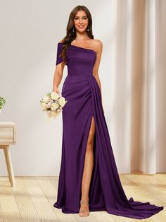 a woman in a long purple dress holding a bouquet and posing for the camera with her legs crossed