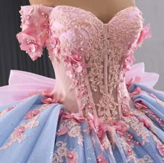 This romantic baby blue and pink ball gown is perfect for your special occasion. The corset style bodice with built-in bra and boning provides a flattering and comfortable fit, while the off the shoulder cuffs and waist peplum add a touch of femininity. The full pleated ball room skirt features delicate pink florals and a bo peep back bow, creating a unique and impressive look. With a lace-up back, this gown is easily adjustable for the perfect fit. Don't miss out on this one-of-a-kind piece that will make you feel like the belle of the ball! material: chiffon, tulle, beading type: a line ball gown color as shown built in bra sweetheart neckline train as shown lace up back Pink Quinceanera Dress, Ball Gown Off Shoulder, A Line Ball Gown, Gown Off Shoulder, Red Quinceanera Dress, Champagne Quinceanera Dresses, Pink Quinceanera, White Quinceanera Dresses, Quinceanera Dresses Gold