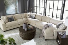 a large sectional couch in a living room