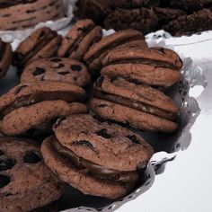 chocolate chip cookies and oreo cookies on tin foil