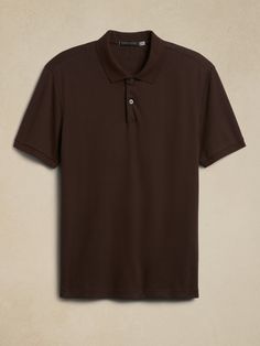 A style for all seasons, this ultra soft cotton polo is crafted to stay fresh even when things heat up.  Anti-Odor, Moisture-Wicking Polo collar with button placket.  Straight hem with vented sides.  Standard fit.  Short sleeves.  Hip length.  Body l Brown Polo Shirt, Brown Polo, Brown Shirt, Stay Fresh, Cotton Polo, Polo Collar, Mens Polo Shirts, Hip Length, Button Placket