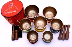 "This is a set of seven gorgeous golden Chakra singing bowls. These singing bowls are between 2.8\" to 5\" in diameter and weigh 7.05 lbs 2.8 kilogram) together. These bowls sing very easily and produce rich, harmonic and soothing sound that lasts for long duration. Together they produce energetic and vibrating sounds which provided stress free relaxation. These singing bowls has been used for meditation, music, relaxation, personal well being, healing energy and chakra creation etc. for generat Golden Chakra, Chakras Yoga, Chakra Heilung, Chakra Symbols, Chakra Yoga, Tibetan Singing Bowls, Seven Chakras, Singing Bowl, Spiritual Teachers