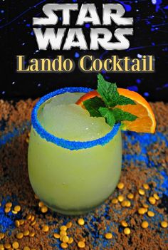 star wars lando cocktail with orange slice and mint garnish on the rim