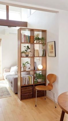 a living room filled with furniture and a wooden table