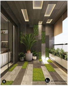 an indoor space with plants and potted plants on the floor, surrounded by concrete walls