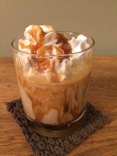 salted caramel white russian drink recipe in a glass with whipped cream on top