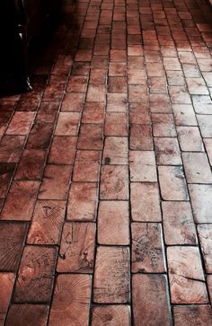 an old brick floor is shown in this image