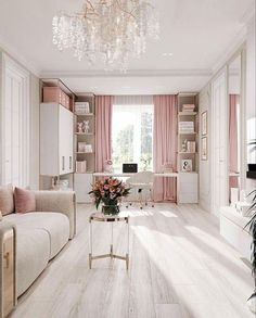 a living room filled with furniture and a chandelier