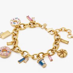 Nwt Kate Spade Coffee Break Donut Charm Bracelet Authentic Color: Multi-Color Brand New/ No Defects Quantity Available For Sale (1) See Photos For Exact Item Details Details: Measurements: Inner Circumference: 7.25"+1.5" Features: Closure Type: Lobster Claw Closure Dust Bag Included: No Materials Cubic Zirconia, Glass Stone, Enamel Base Metal: Plated Metal Metal Finish: Polished Metal Color: Gold Imported. No Exchanges No Returns No Buyers Remorse No Low Ball Offers We Waive All Liability Of All Kate Spade Charm Bracelet, Charm Bracelet Aesthetic, Kate Spade Bracelet, Kate Spade Bangle, Preppy Jewelry, Mail Carrier, Faux Pearl Bracelet, Rose Gold Bangle, Cow Painting