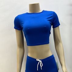 Crop Top T-Shirt,Short Sleeves,Soft Fabric Casual Solid Woman Top Perfect For Going Out, Dating, Party And Casual Daily Wear. Available In 8 Colors: Red; Black; White; Hot Pink; Light Pink; Blue; Mint; Light Blue . 100% Polyester, Machine Washable. Light Blue Short Tops For Summer, Light Blue Short Summer Tops, Basic Short Stretch Tops, Basic Stretch Tops, Basic Blue Tops For Summer, Basic Fitted Short Tops, Fitted Short Basic Tops, Trendy Solid Color Blue Tops, Trendy Blue Solid Color Tops