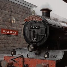 an old fashioned train is on display at the hogwart's express museum