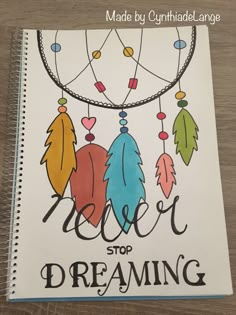 an adult coloring book with the words never stop dreaming