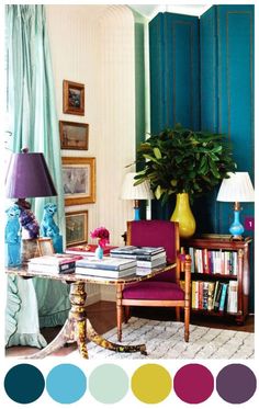 a living room filled with furniture and lots of color