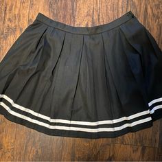 Never Worn Was Going To Use For A Costume But Never Did Tags Still Attached Black Cotton Tennis Skirt, Preppy Black Skort For Spring, Preppy Black Tennis Skirt For Spring, Black Preppy Skort For Spring, Black Cotton Lined Tennis Skirt, Preppy Black Spring Skort, Black Cotton Tennis Skirt With Lining, Preppy Black Skort For School, Preppy Black Skort For Summer