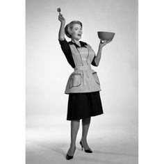 1960s Excited Woman Housewife In Apron Black Dress And High Heels Looking At Camera Holding Up Mixing Bowl And Kitchen Image 1 Neutral Canvas Art, Dress And High Heels, 1950s Women, Rainbow Canvas, Cow Canvas, Scalloped Lace, Fine Arts Posters, Color Of Life, Vintage Images