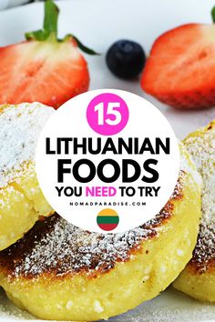 some food on a plate with strawberries and blueberries in the background that says, 15 ethiopian foods you need to try