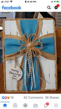 a blue and white gift wrapped in burlock