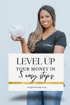 a woman holding a piggy bank with the words level up your money in easy steps