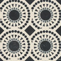 a black and white tile with circles on it