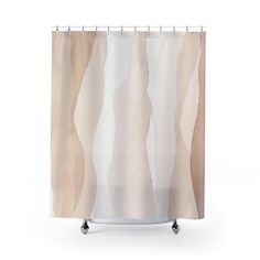 a shower curtain with different colors and shapes on the outside, in front of a white background