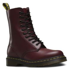 The 1490 10-eye boot is a classic Dr. Martens punk silhouette — laced even higher for an amped-up attitude. 10-eye boot Made with classic Doc's DNA, including grooved edges, yellow stitching and heel-loop Built on the iconic Dr. Martens air-cushioned sole, which is oil and fat resistant, with good abrasion and slip resistance Material: Airwairs original signature leather: a firm, finished leather with a smooth, semi bright appearance. Care Instructions: [Smooth] = Clean Away dirt using a damp cl Stacked Heel Boots, Real Leather Boots, Doc Martens Boots, Dr Martens Boots, Genuine Leather Boots, Mens Leather Boots, Boots Uk, Leather Lace Up Boots, Military Boots