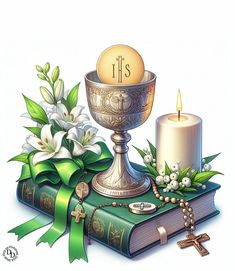 a candle and some flowers are on top of a book next to a chalicee