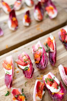 some food is laying out on a cutting board and ready to be cut into bite sized pieces