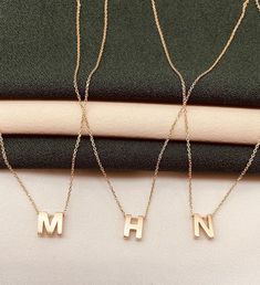 Discover the elegance of our 14k gold letter necklace, a perfect blend of sophistication and personalization. This dainty custom initial pendant is an ideal gift for any occasion, from birthdays to anniversaries, offering a timeless piece of jewelry that she will cherish forever. ✨ High-Quality 14k Gold: Made with genuine 14k gold for a luxurious and lasting shine. 🎁 Personalized Initial: Customizable with any letter of your choice to create a meaningful keepsake. 💎 Elegant Design: Features a Elegant 14k Gold Initial Necklace For Personalized Gift, Elegant 14k Gold Initials Charm Necklace, Elegant 14k Gold Monogram Charm Necklace, Elegant Yellow Gold Initials Charm Necklace, Elegant Personalized White Gold Initial Necklace, Luxury Initial Pendant Name Necklace As Gift, Luxury Initial Pendant Necklace For Gift, Elegant Initial Necklace With Delicate Chain As Personalized Gift, Delicate Gold Initial Necklace For Personalized Gift