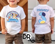 two toddlers wearing matching t - shirts with the same image as their names on them