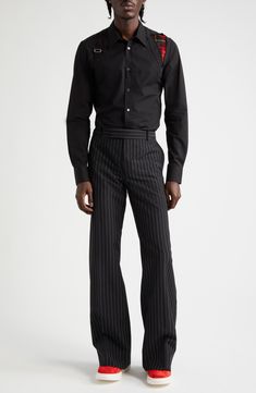 Pinstripes inspired by the unofficial uniform of the Prohibition era solidify the heritage look of wool-and-mohair pants tailored to perfection. Zip fly with hook-and-bar closure Front slant pockets 75% wool, 25% mohair Dry clean Made in Italy Designer Clothing Alexander Mcqueen Pants, Tailored Pinstripe Pants With Belt Loops, Black Business Casual Pants With Vertical Stripes, Striped Business Trousers, Black Pants With Vertical Stripes For Business Casual, Business Casual Black Pants With Vertical Stripes, Black Vertical Stripe Pants For Business Casual, Fitted Black Pants With Vertical Stripes, Striped Trousers For Business