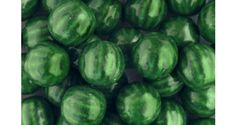 many green vegetables are stacked up together