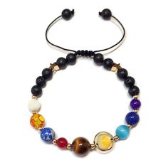 PRICES MAY VARY. This bracelet is handmade from natural stones, which contains NINE different colors of stones, corresponding to the NINE planets in solar system. Unique Design:This is the coolest bracelet for people who likes astronomy! The beads represent the nine planets : Mercury, Venus, Earth, Mars, Jupiter, Saturn, Neptune, Uranus and Pluto. Those small black Lava stones represent the black hole in the outer space. This bracelet has two styles, one is with elastic string, another is woven Planets In Solar System, Planets In The Solar System, Star Bracelets, Eight Planets, Nine Planets, Planets And Moons, You Are The Sun, Universe Galaxy, The Solar System