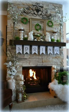 a fireplace decorated for spring with wreaths and bunting