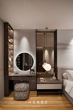 a bedroom with a bed, desk and mirror