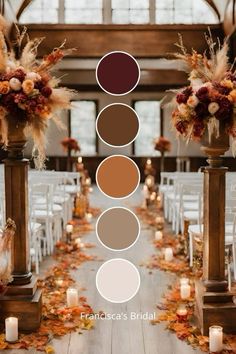 an aisle decorated with fall leaves, candles and flowers in shades of brown, beige, red, and white