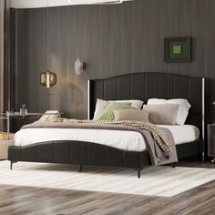 This platform bed is wrapped in leather as a whole, with a headboard with a winged back and metal bars, making the bed overall calm and introverted and luxurious, with a classic and timeless design style that is suitable for a wide range of home styles. The bed frame and slats are made of high-density plywood with a solid structure for your restful sleep. Wrought Studio™ Color: Black | Wrought Studio™ Arjunveer Vegan Leather Platform Bed 42.9 H x 61.6 W x 85.4 D in brownUpholstered / Faux leathe Platform Bed Headboard, Leather Upholstered Headboard, Contemporary Bed Frame, Leather Platform Bed, Leather Wingback, Wingback Bed, Bed Black, Wingback Headboard, Queen Size Bed Frames