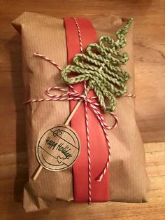 a present wrapped in brown paper and tied with twine