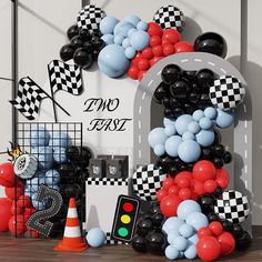 the balloon letters are decorated with black, white and red balloons