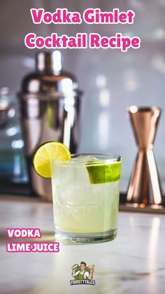 a cocktail with lime on the rim and vodka garnish in the glass next to it