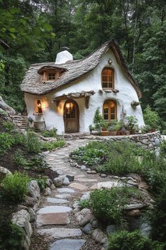 a white house with a stone pathway leading to it