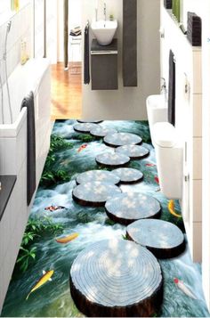 the bathroom floor is decorated with fish and trees on it's sides, while there are