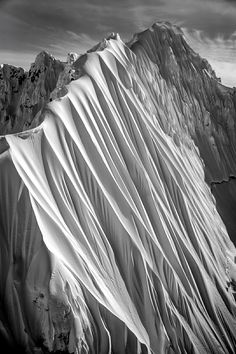 the top of a mountain covered in snow