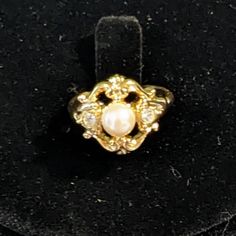 Avon Gold Tone Ring Faux Pearl In The Center 2 Clear Gemstones On Either Side Of The Pearl Size 8 Never Worn Smoke Free Home Clear Gemstones, Art Nouveau Floral, Gold Tone Necklace, Gold Hands, Vintage Avon, The Pearl, Pearl Size, Beauty Make Up, Brown Gold