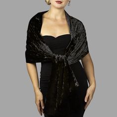 A very elegant velvet shawl for your wedding party or evening dress. Made of luxury bridal velvet.  Color: black  (other colors are available)  Size: 190 cm x 48 cm approx. The shawl on the photo is not lined.  Choose: one sided or double sided (both sides velvet)  For additional request, please contact.  You can use it as a wrap, shawl or stola. WE have matching bags in our Etsy Shop! WE accept credit cards! Warning: Although the fabric we use is of high quality, in certain cases during high hu Luxury Festive Velvet Shawl, Elegant Winter Velvet Dress, Elegant Black Velvet Holiday Dress, Elegant Velvet Dress For Wedding, Black Velvet Gala Dress, Formal Fitted Black Shawl, Fitted Black Shawl For Party, Elegant Black Shawl For Wedding, Elegant Fitted Shawl For Evening