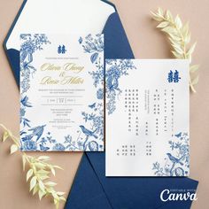 two wedding cards with blue and white designs on them, next to an envelope that has a calendar