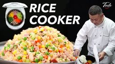 a chef is preparing rice cooker with vegetables and meats on the plate in front of him