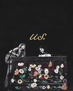 two people sitting at a table with flowers on it and the words u o written in gold