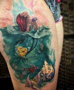 the little mermaid is sitting on top of the big fish in the ocean and under the water